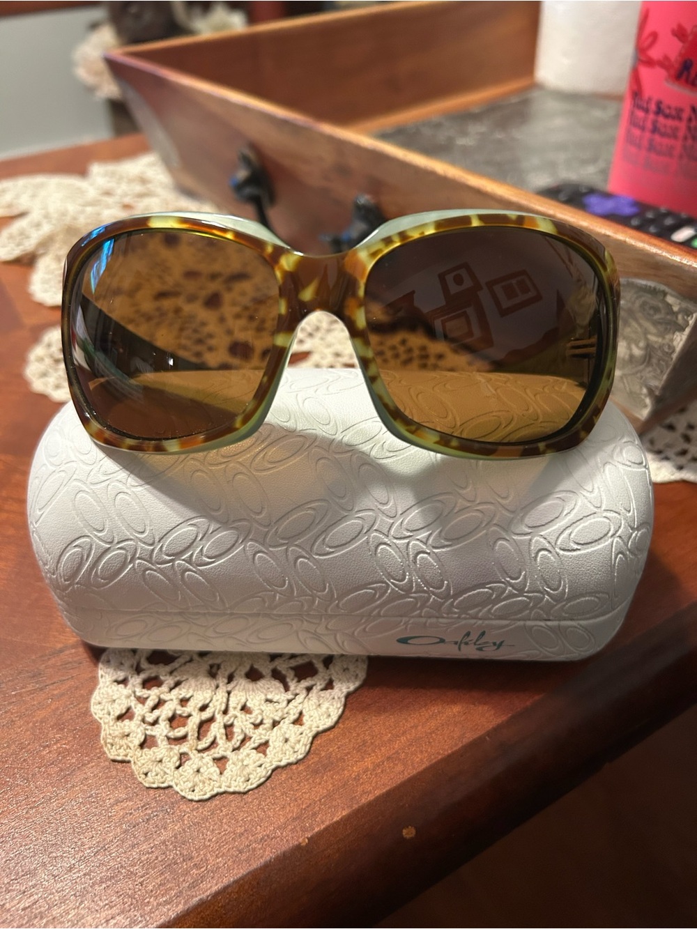 Oakley Tortoiseshell Frame Sunglasses with Brown Lenses